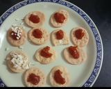 A picture of step 2 of Papdi pizza with salsa topping.
