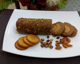 A picture of step 12 of Biscuits Meethi (Swiss roll style).