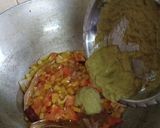 A picture of step 10 of Dahi wali bhindi.