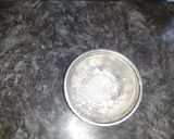 A picture of step 4 of Eggless Doll cake pineappple flavour.