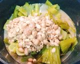 Hình bước làm 3 của món Canh dưa cải chua nấu đậu phộng rau thì là