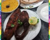 A picture of step 3 of Fry fish, Mung aur masoor ki daal aur Roti.