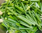 A picture of step 1 of Onion stalk stir fried with Potato.
