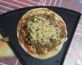 Foto del paso 6 de la receta: Pizzitas de berenjena, tomate, cebolla y queso