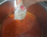 A picture of step 5 of Herbal Turmeric Cinnamon Immunity Booster Tea.
