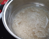 Foto del paso 3 de la receta: Conejo encebollado con arroz blanco al ajillo