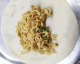 A picture of step 9 of Noodle spring roll.