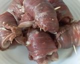 Foto del paso 3 de la receta: Niño envuelto de carne con jamón y queso