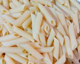 A picture of step 2 of Indian style Penne Pasta.