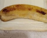 Foto langkah ke 2 dari resep Roti Bakar Gulung Pisang Keju.