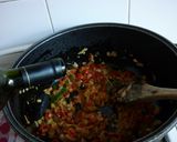 Foto del paso 4 de la receta: Guiso de arroz, papas y salchichas parrilleras