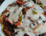 Foto del paso 6 de la receta: Pizza de champiñones y pimientos con masa de zanahoria y coliflor🍕🧀🍳🥕🍄‍🟫🫑