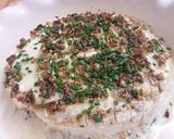 A picture of step 4 of Savory Garlic and Herb Baked Brie.