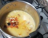 A picture of step 5 of Fabada with Chorizo, Blood Sausage, and Pork Ear in a Pressure Cooker.
