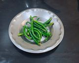 A picture of step 1 of Instant Green Chilli Pickle.