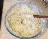 A picture of step 1 of Tzatziki (yoghurt and cucumber dip).