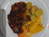 Steak with vegetables and black paper sauce