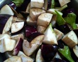 A picture of step 1 of Brinjal potatoes and tomato sabji(no onion no garlic).