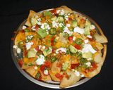 A picture of step 5 of NACHOS WITH GOAT CHEESE, AVOCADO, AND SOUR CREAM.