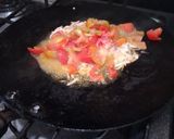 A picture of step 2 of Tawa masaledar kale chanay.