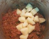 A picture of step 7 of Chicken curry.