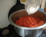 A picture of step 3 of Gajar ka halwa (colourful dish).