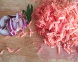 A picture of step 1 of Carrot rice.