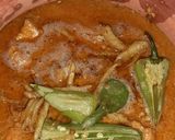 A picture of step 8 of Chicken handi.