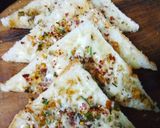 A picture of step 3 of Cheesy garlic bread.