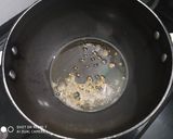 A picture of step 2 of UP style Dahi wali Arbi Spicy Arbi in yogurt curry.