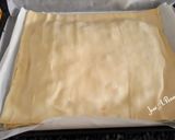 Foto del paso 2 de la receta Empanada de atún y pimientos rojos asados