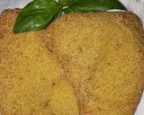 Foto del paso 4 de la receta: Milanesas rebozadas con polenta y condimentadas con albahaca