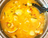 Foto del paso 3 de la receta: Arroz caldoso con almejas y gambas 🥘🦐
