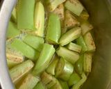 A picture of step 3 of Kerala Style Baingan Dal Curry.
