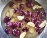 A picture of step 1 of Potato-Brinjal Sabzi.