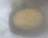 A picture of step 1 of Leftover Salmon-Mushroom Fettuccine Alfredo.