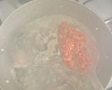 A picture of step 2 of Chicken pepper soup and white rice.