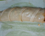 Foto del paso 7 de la receta: Brazo de gitano salado relleno gambas ajos tiernos y espárragos