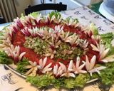 Une image de l'étape 10 de Salade de tomates,scarole,céleri et thon aux radis « fleurs ».