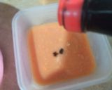 A picture of step 2 of Orange chicken.