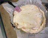 Une image de l'étape 12 de Tourte au munster, oignon, cumin et vin blanc.