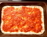 Foto del paso 5 de la receta: Pizza muzzarella con rúcula y tomates secos