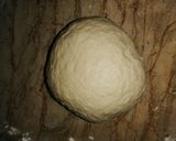 A picture of step 4 of Custard filled Donut balls:.