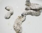 A picture of step 2 of Fried mopane worm.