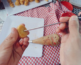 Foto del paso 12 de la receta: Croquembouche (masa choux y crema pastelera)