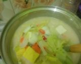 Foto langkah ke 5 dari resep Sawi putih kuah santan.