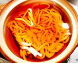 A picture of step 2 of Super Easy! Just Slice, Top, and Simmer Nabeyaki Udon.