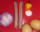 A picture of step 1 of Eggs in Sausage.