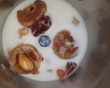 A picture of step 2 of Mix dryfruit milkshake.