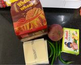 A picture of step 1 of Chilli Cheese Toast on tawa.